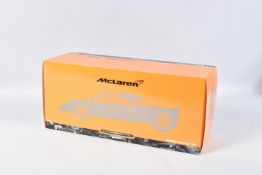 A BOXED MINICHAMPS MCLAREN F1 ROAD CAR 1994 1:18 MODEL VEHICLE, numbered 530 133421, painted orange,