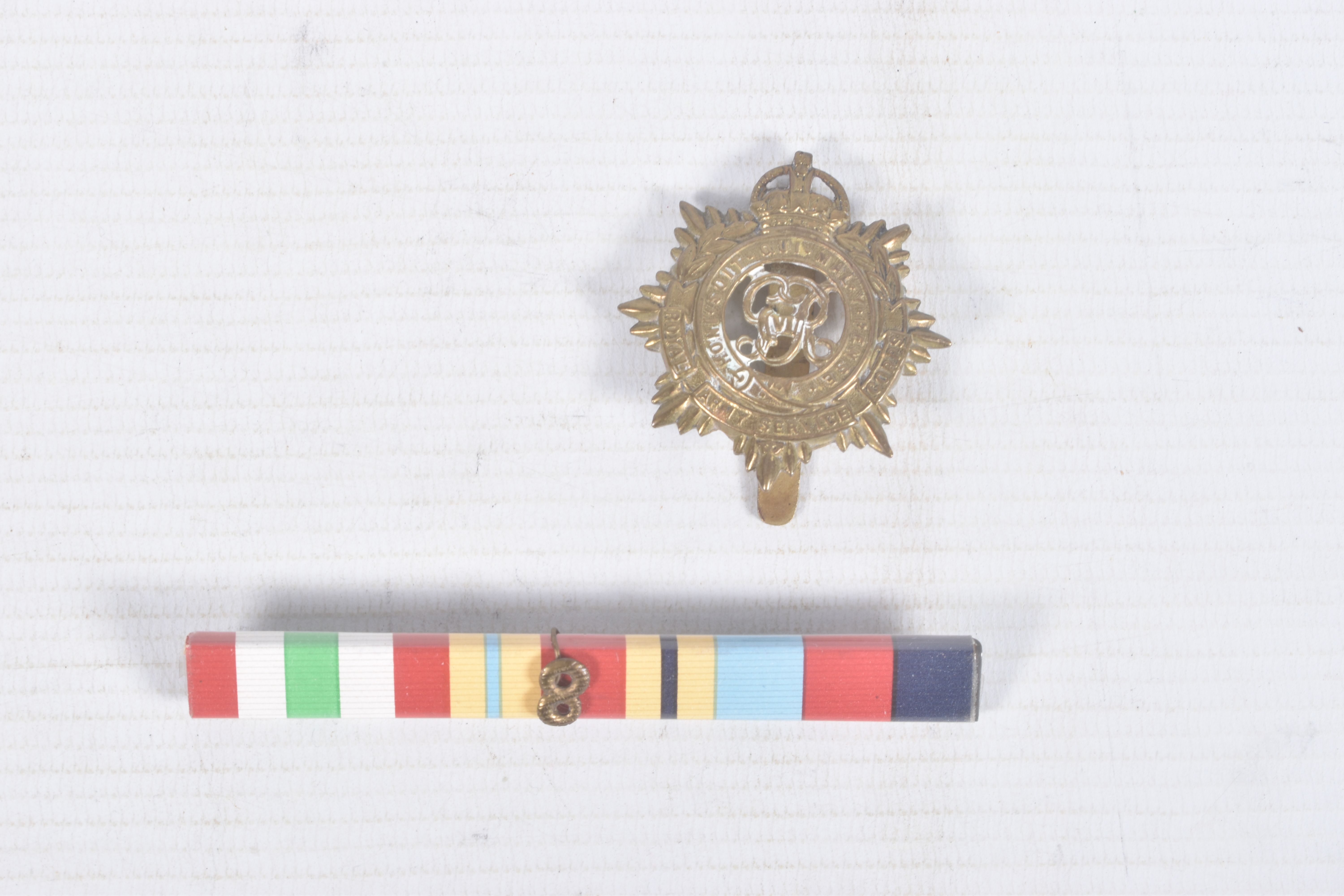 A TIN CONTAINING FOUR WWII MEDALS, a ribbon bar and a cap badge, the medals are all un-named and - Image 2 of 12