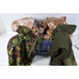 A BOX OF MILITARY RELATED CLOTHING, to include five pairs of desert trousers and one jacket and Army