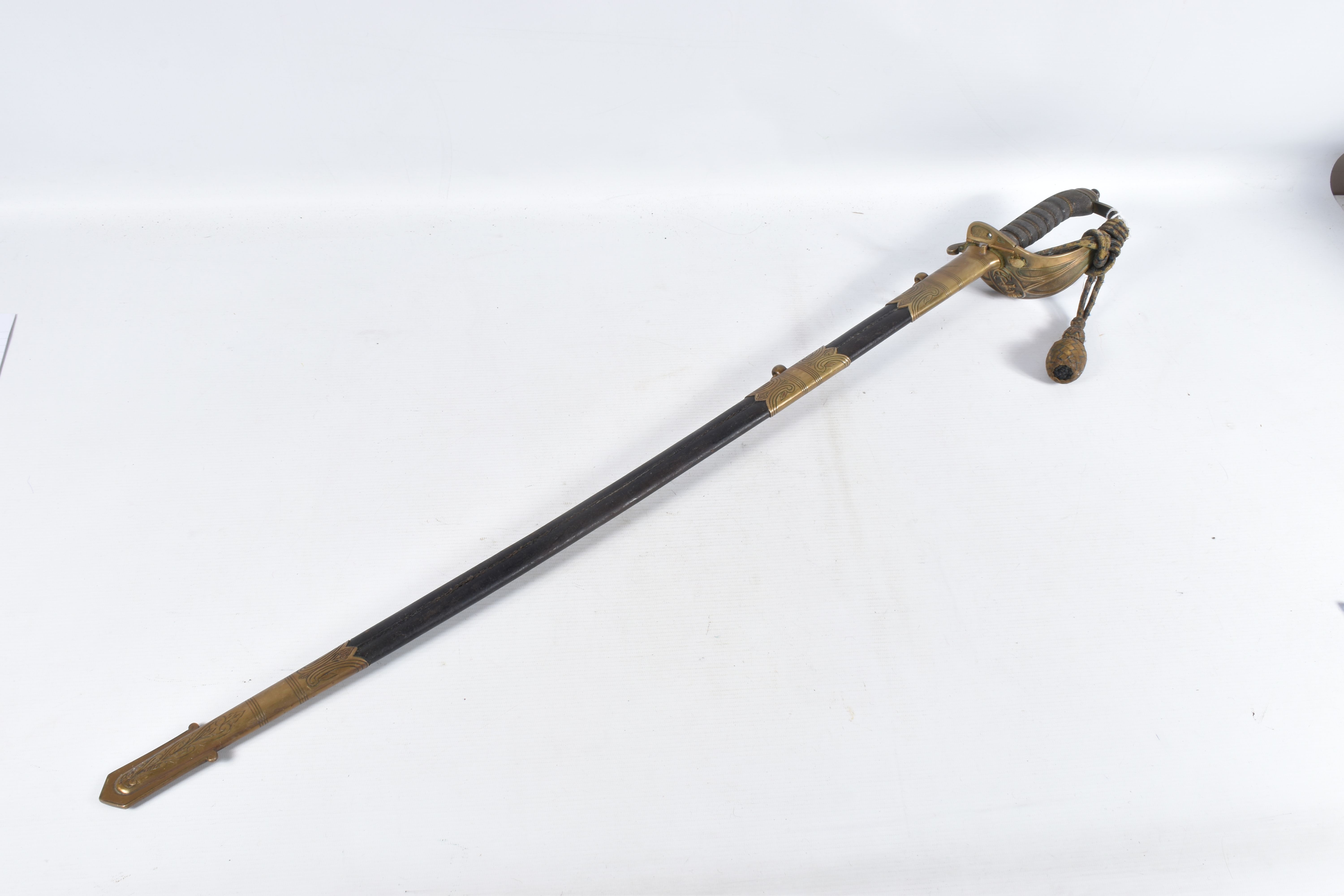 A 19TH OR 20TH CENTURY NAVAL DRESS SWORD, the blade has some ornate decoration on it but it is