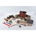 A SELECTION OF MILITARY ITEMS TO INCLUDE POSTARDS, bible, binoculars, goggles and ribbon bars,