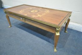 A REPRODUCTION EMPIRE STYLE MARQUETRY COFFEE TABLE, with a brass gallery, mounts and claws, length