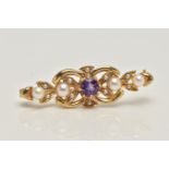 A 9CT GOLD AMETHYST AND SEED PEARL BROOCH, open work brooch set with a central circular cut