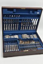 AN INCOMPLETE WOODEN CANTEEN, 'Mappin & Webb' canteen of beaded silver plate cutlery, eight person