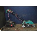 A BOSCH ROTAK370 ER ELECTRIC LAWN MOWER with grass box (PAT pass and working)