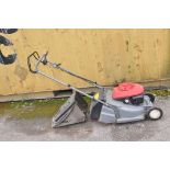 A HONDA HRB425C PETROL LAWN MOWER with grass bag (engine pulls freely but hasn't been started)