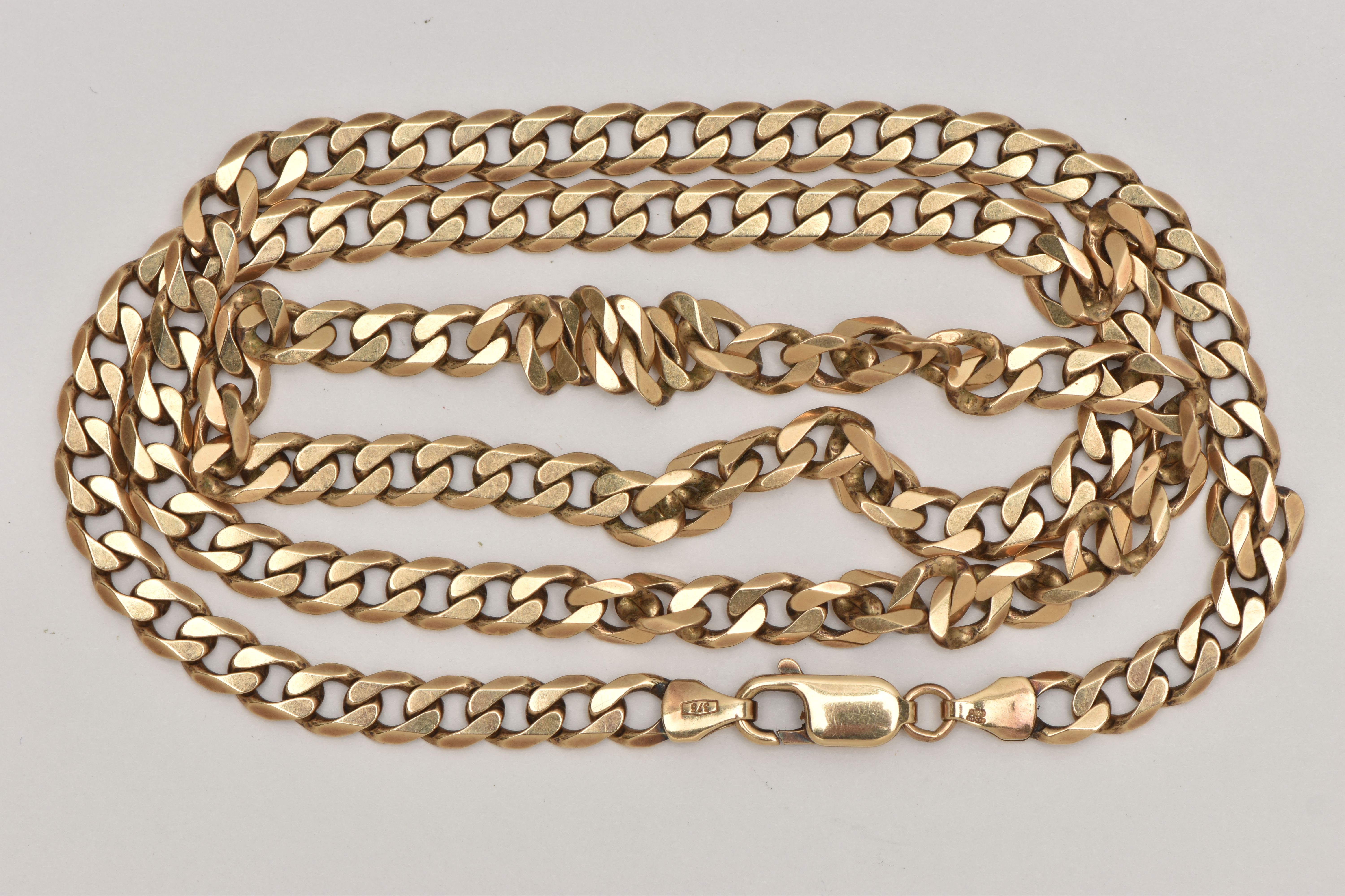 A 9CT GOLD CURB LINK CHAIN NECKLACE, with a spring release clasp, a 9ct hallmark, length 580mm,
