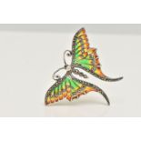 A WHITE METAL PLIQUE A JOUR BROOCH, in the form of butterfly with red, green and yellow enamel