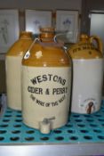 THREE STONEWARE FLAGONS, 'Westons Cider & Perry' with screw top and tap to side, 'Good its Masons'
