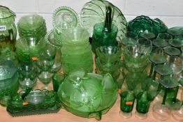 A QUANTITY OF 20TH CENTURY GREEN PRESS MOULDED AND OTHER GREEN COLOURED GLASSWARE, including hock