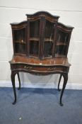 A 20TH CENTURY MAHOGANY CABINET ON STAND, the top with four glazed doors, enclosing shelves, the