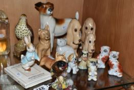 A COLLECTION OF CERAMIC ANIMAL FIGURES, to include a Beswick Peter Rabbit 'Peter on His Book' P4217,