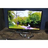 A SAMSUNG UE46ES6300 46in 3D TV with remote and glasses (battery need changing) along with a Toshiba