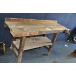 A BESPOKE WOODEN WORKBENCH with a Woden 189B woodworking vice attached width 155cm x depth 60cm x