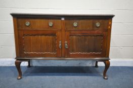 A VICTORIAN MAHOGANY SIDEBOARD, with two drawers, above two cupboard doors, on cabriole legs,