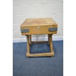 A SQUARE BUTCHERS BLOCK, on a later pine stand, 61cm squared x height 79cm (condition report: well