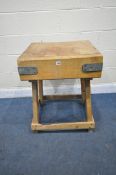 A SQUARE BUTCHERS BLOCK, on a later pine stand, 61cm squared x height 79cm (condition report: well