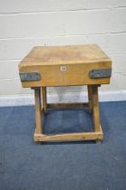 A SQUARE BUTCHERS BLOCK, on a later pine stand, 61cm squared x height 79cm (condition report: well