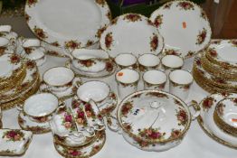A ROYAL ALBERT OLD COUNTRY ROSES COMPREHENSIVE DINNER SERVICE AND A SMALL QUANTITY OF MATCHING
