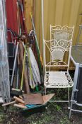 A PAIR OF ORNATE MODERN METAL FOLDING GARDEN CHAIRS and a selection of garden tools including