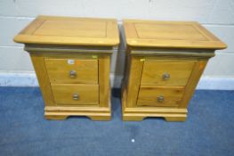 A PAIR OF LIGHT OAK TWO DRAWER BEDSIDE CHESTS, width 53cm x depth 40cm x height 64cm (condition