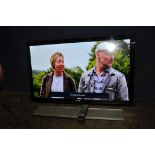 A TOSHIBA REZGA 42RL853 42in TV with remote and wall bracket (PAT pass and working)