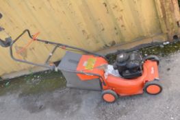 A FLYMO RL400PETROL LAWN MOWER with a Briggs and Stratton engine (pulls and starts)