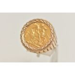 A SOVEREIGN RING, designed as a 1901 full sovereign within a 9ct banded ring mount, ring with 9ct