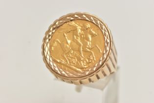 A SOVEREIGN RING, designed as a 1901 full sovereign within a 9ct banded ring mount, ring with 9ct