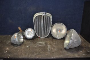 A SELECTION OF VINTAGE AUTOMOTIVE PARTS including chromed front grille, width 37cm x height 51cm,