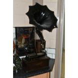 AN EARLY 20TH CENTURY THOMAS EDISON PHONOGRAPH, serial number H322216, with a black painted papier