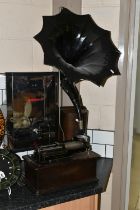 AN EARLY 20TH CENTURY THOMAS EDISON PHONOGRAPH, serial number H322216, with a black painted papier