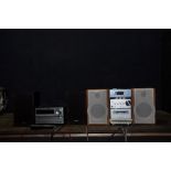 A SONY CMT-EP313 MINI HI FI WITH MATCHING SPEAKERS and a Philips DCB2020 with matching speakers