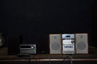A SONY CMT-EP313 MINI HI FI WITH MATCHING SPEAKERS and a Philips DCB2020 with matching speakers