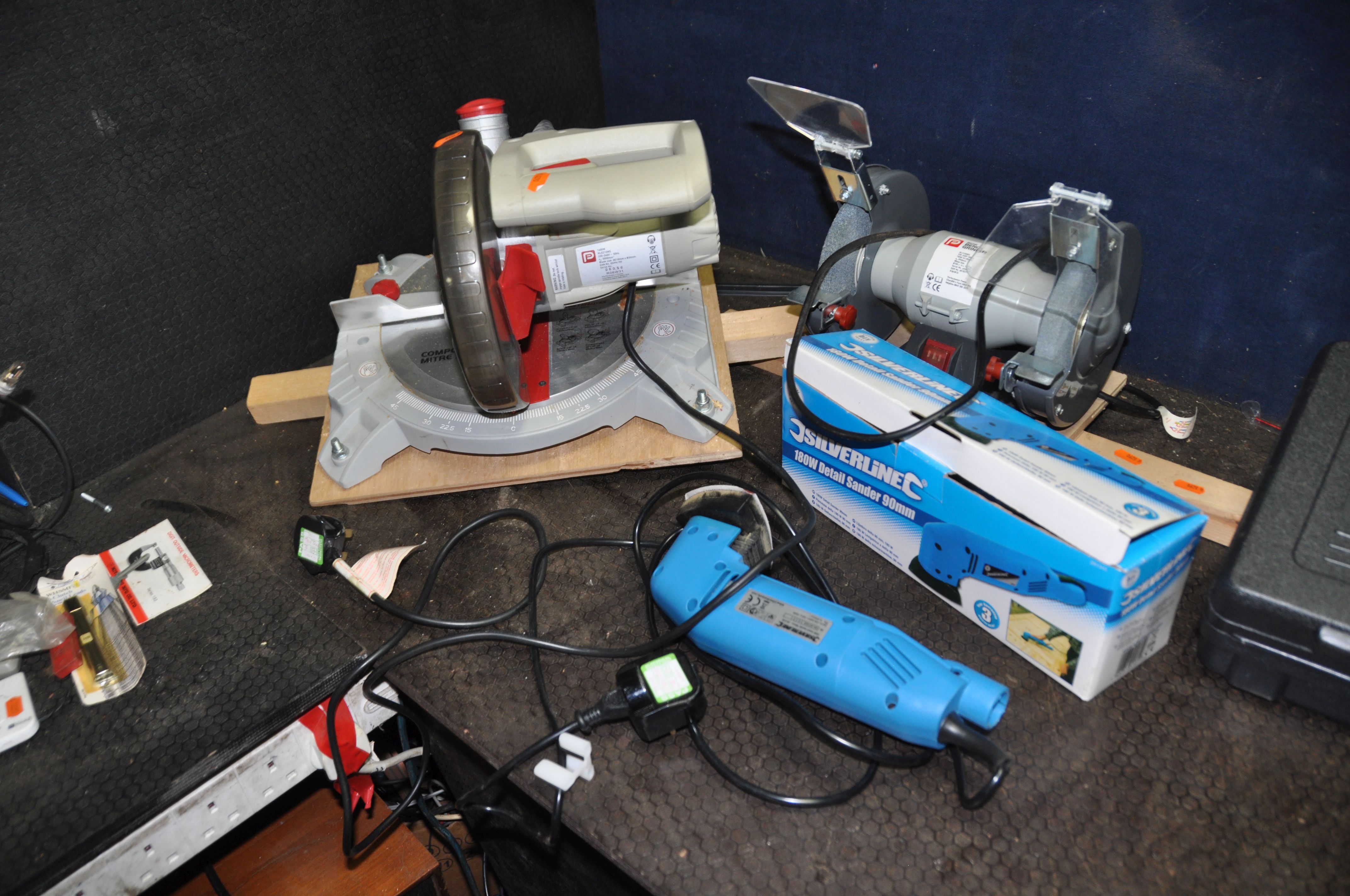 A COLLECTION OF POWER TOOLS including a Performance NLE210MS Compound Mitre Saw, a Performance - Image 2 of 4