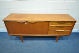 A MID-CENTURY TEAK JENTIQUE SIDEBOARD, with double cupboard doors, besides three graduated
