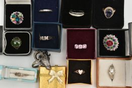 A SELECTION OF WHITE METAL RINGS, twelve rings in total some set with gemstones or paste, most