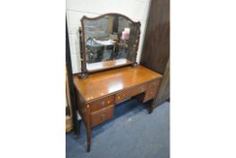 A MAHOGANY DRESSING TABLE, with a single mirror, and five drawers, width 123cm x depth 57cm x height