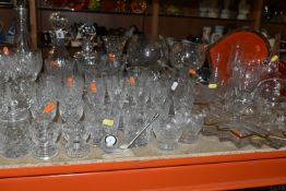 A QUANTITY OF GLASSWARE, comprising three decanters, a set of six cut glass wine glasses, a small