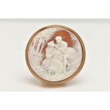 A 9CT GOLD CAMEO BROOCH, of a circular form, carved shell cameo depicting a couple scene, collet set