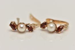 A PAIR OF YELLOW METAL GARNET AND PEARL EARRINGS, each earring set with a single cultured pearl