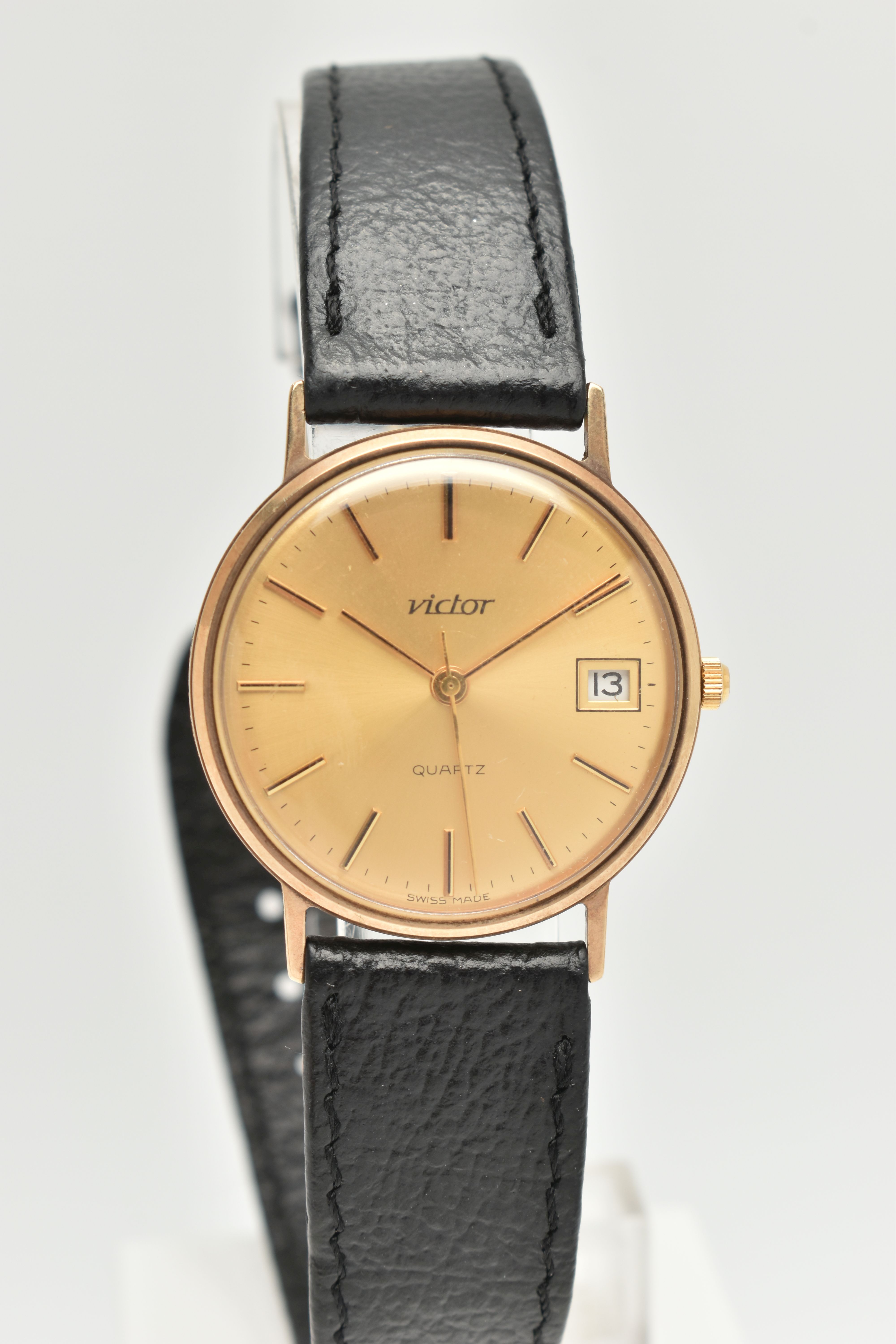 A GENTS 9CT 'VICTOR' WRISTWATCH, quartz movement, round gold dial signed 'Victor', baton markers,