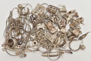 A SELECTION OF SILVER AND WHITE METAL JEWELLERY, to include a charm bracelet suspending 21 charms