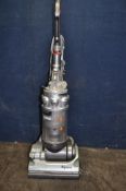 A DYSON DC14 UPRIGHT VACUUM CLEANER (PAT fail due to tape cable but working) (Condition some paint
