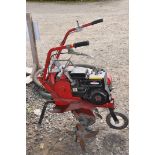 A MOUNTFIELD MANOR 3 with a Briggs and Stratton 3 hp engine (engine pulls freely but hasn't
