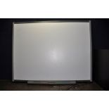 A SMARTECH SMART BOARD with USB cable