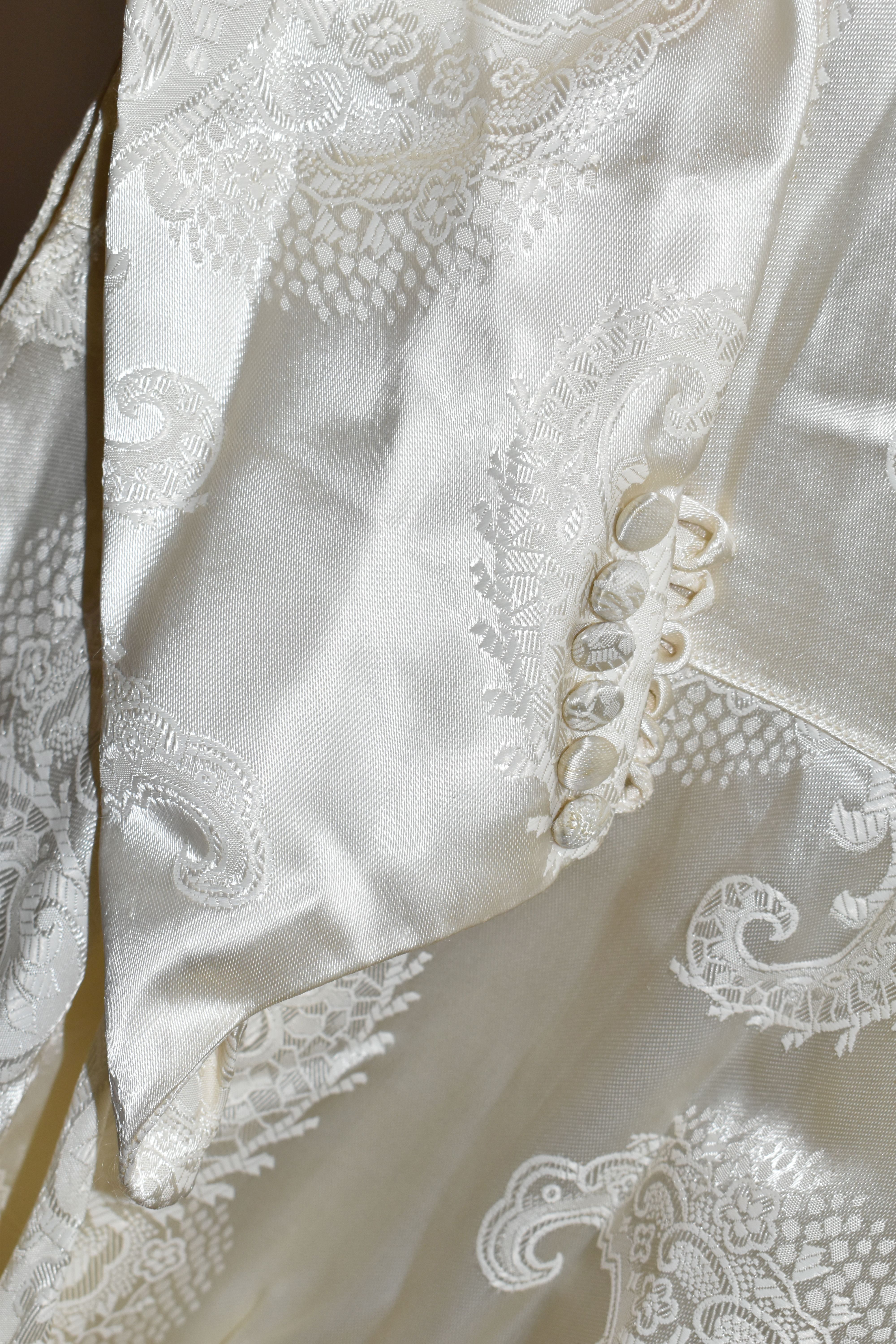 A VINTAGE WEDDING DRESS, bespoke dress with a court train, paisley design cream satin, long - Image 4 of 9