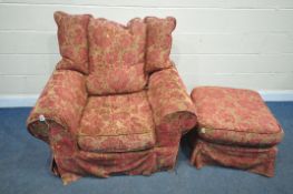 A LARGE ARMCHAIR, with red floral upholstered cover, width 112cm x depth 96cm x height 89cm, and a