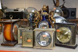 A GROUP OF TEN MANTEL CLOCKS, comprising a mid- century USSR Vesna mantel clock, an oak cased clock,