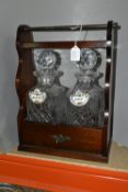 MAHOGANY TANTULUS, with brass carry handle, containing pair of decanters, width 25.5cm x 36cm,